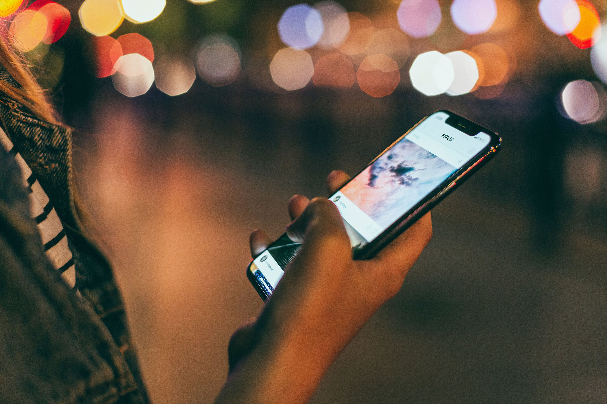 person checks the cellphone screen