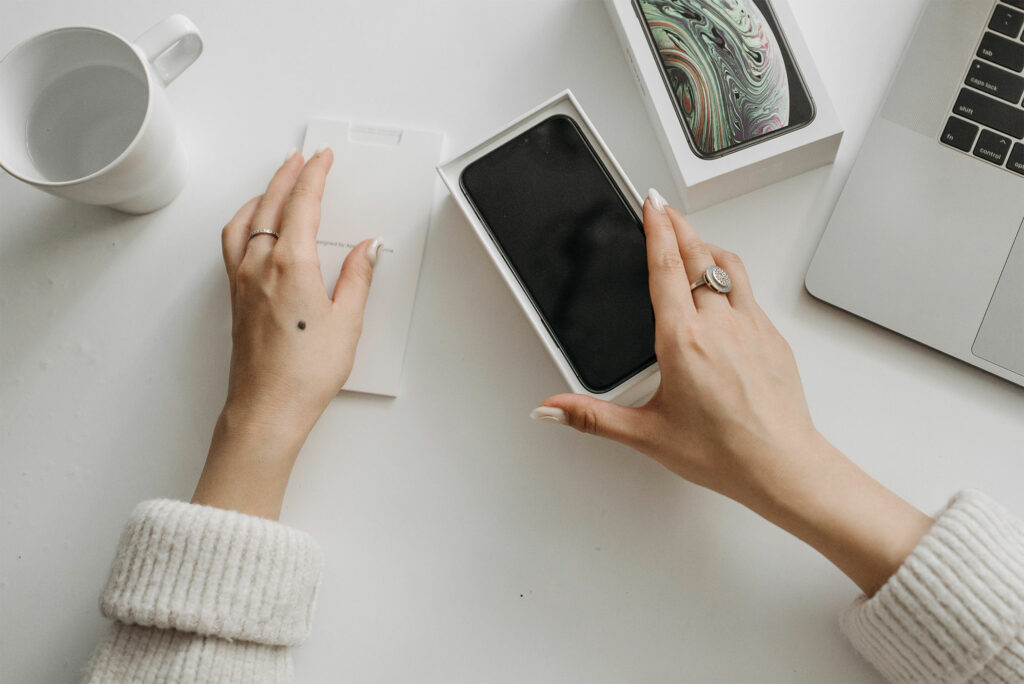 woman holding a phone 