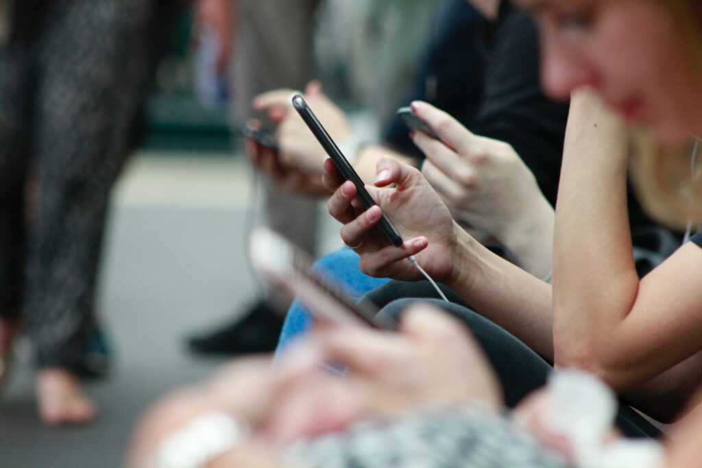 woman looking at the phone