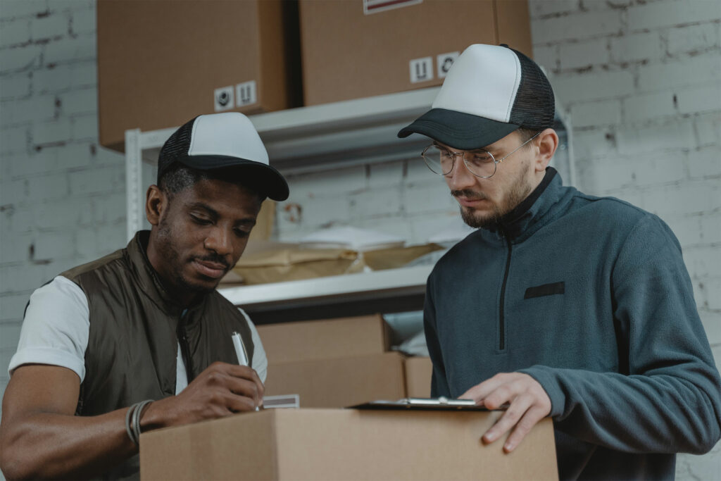 Man sending mobile phone through a courier